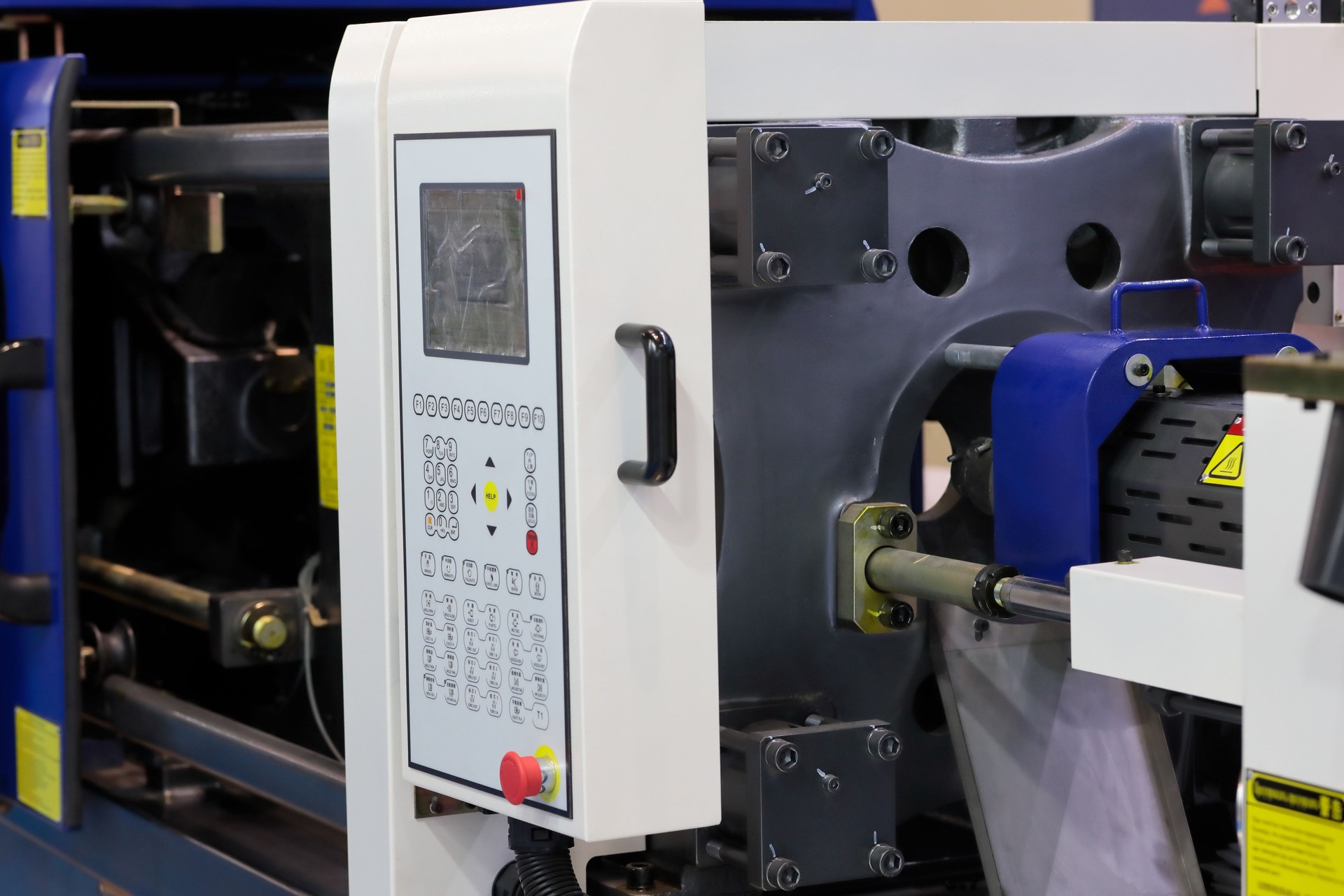 closeup of plastic injection molding press machine